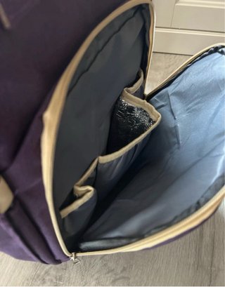 Mochila, cambiador y cuna portátil.