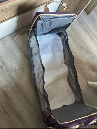 Mochila, cambiador y cuna portátil.