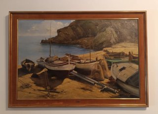 Cuadro al óleo de barcos en la playa