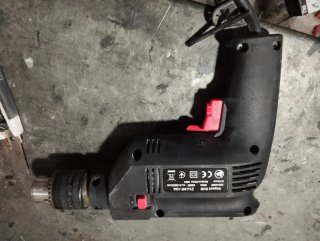 Taladro Eléctrico Negro y Rojo
