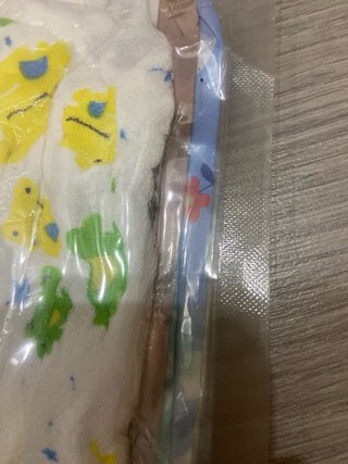 Baberos de plástico con mangas
