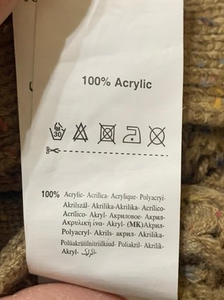 Cardigan in maglia con cappuccio in pelliccia