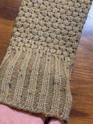 Cardigan in maglia con cappuccio in pelliccia