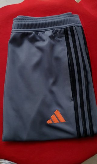 Pantalón deportivo Adidas hombre gris naranja