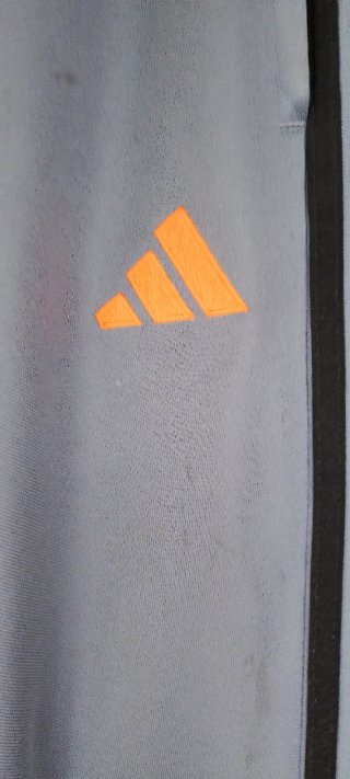 Pantalón deportivo Adidas hombre gris naranja