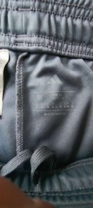 Pantalón deportivo Adidas hombre gris naranja