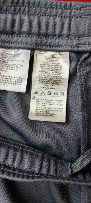 Pantalón deportivo Adidas hombre gris naranja