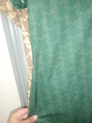 2 vestidos Lacoste uno verde y uno marron