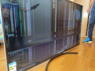 TV LG 65 para piezas escucho ofertas.pantalla negr