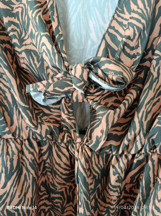 Macacão curto estampado zebra