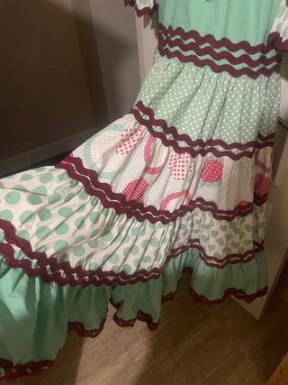 Traje de flamenca verde con volantes