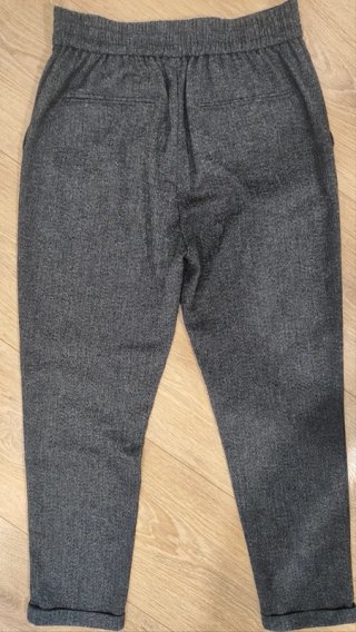 Pantalón gris jaspeado de pinzas