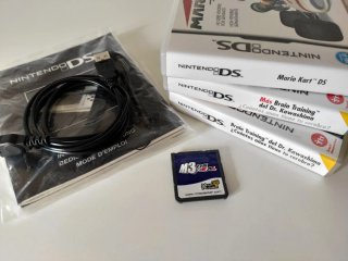 Nintendo DS + 4 Juegos Mario Kart y Brain Training