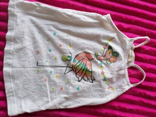 Chaleco H&M niña negro lunares. Precio de 3 a 20€