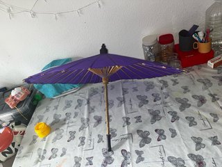 Paraguas morado plegable