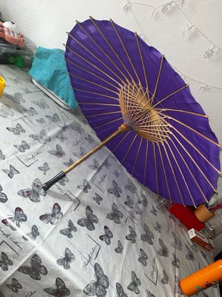 Paraguas morado plegable