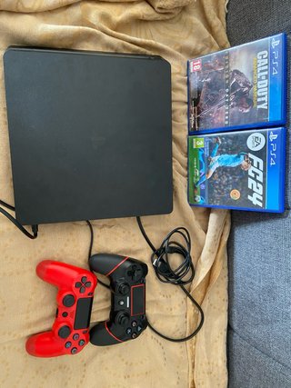 Consola PS4 1TB + 2 Mandos + 2 Juegos.