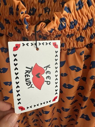 Vestido midi naranja estampado