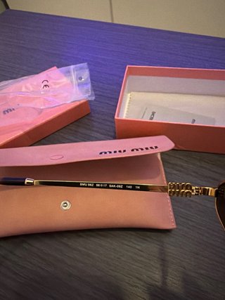 Gafas de sol Miu Miu Diamante Doradas