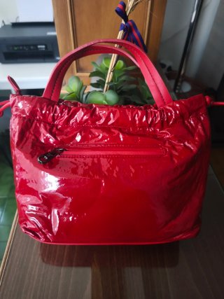Bolso Pepe Moll rojo charol con etiqueta