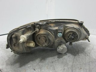 Opel 1553594 faro izquierdo 90520877lh astra g 1.6