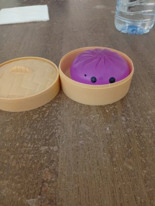 Juguete viral dumplings morado