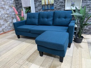 Sofá azul con puf convertible