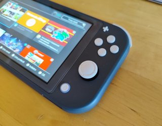Nintendo Switch Lite + Super Mario Bros. U Deluxe