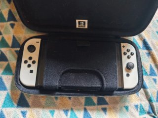 Nintendo Switch OLED Blanca + Funda Original