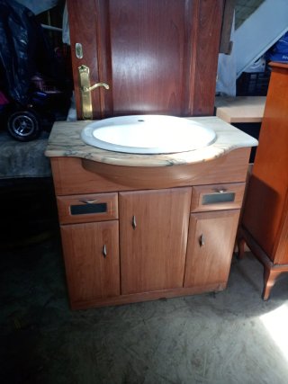 Mueble de baño con lavabo de mármol