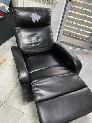 Sillón reclinable de piel negro