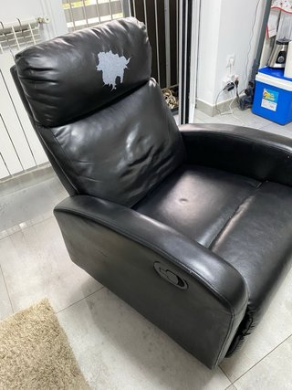 Sillón reclinable de piel negro