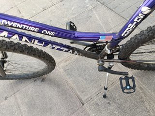 Bicicleta mandarían entre one morada