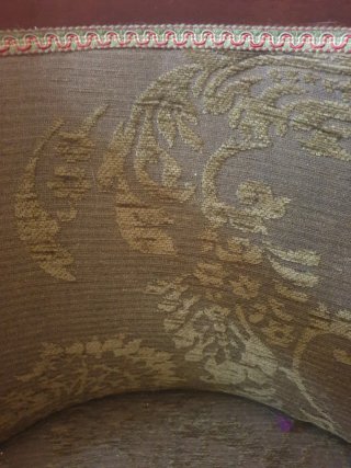 Descalzadora antigua de madera y tela