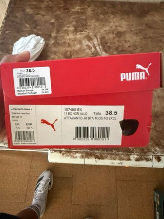 Botas de fútbol Puma niño negras y amarillas