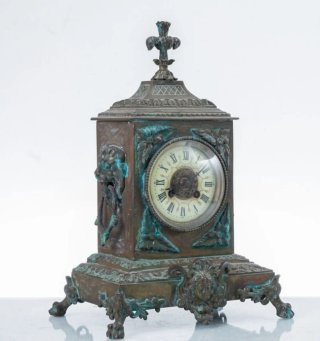 Orologio da tavolo antico in metallo