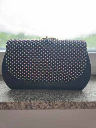 Bolsa preta com brilho