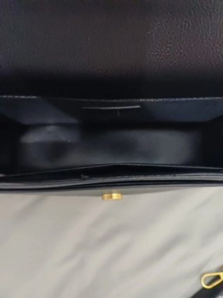 Bolso Coach Negro con Detalle Dorado