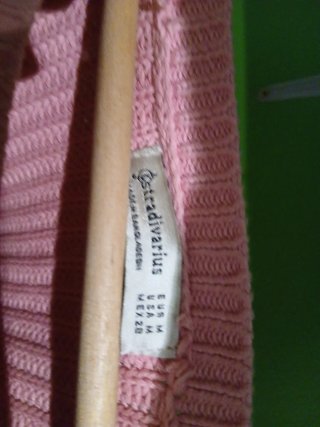 Jersey rosa tejido con trenzas