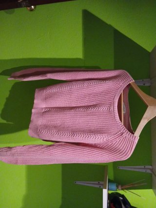 Jersey rosa tejido con trenzas