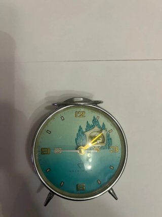 Reloj despertador vintage plateado