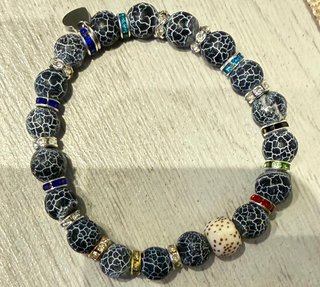 Braccialetto elastico unisex con charm
