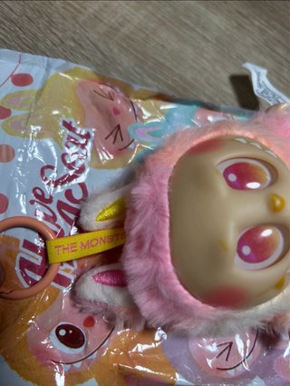 Muñeca Labubu Pop Mart Peluche Naranja Rosa