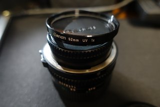 Canon FDn 50mm f/1.4 Black with filter and caps