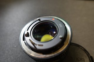 Canon FDn 50mm f/1.4 Black with filter and caps