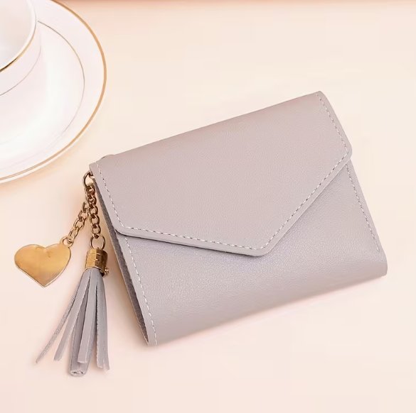Cartera de mujer en rosa o en morado claro