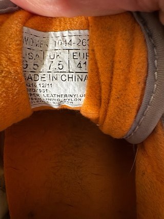 Saucony Jazz grigie arancioni borchie