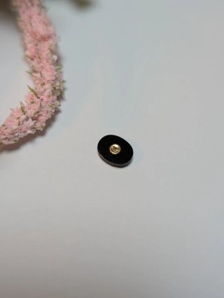 Pieza de joyería onix oro y diamante