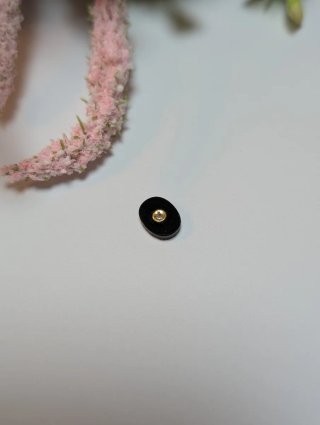 Pieza de joyería onix oro y diamante