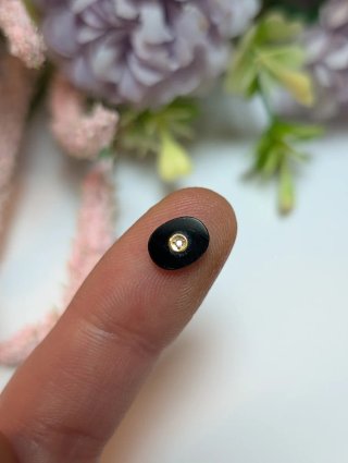 Pieza de joyería onix oro y diamante